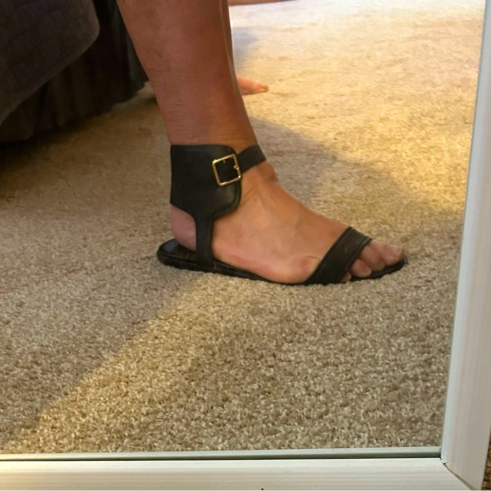 Call Han, gladiator type sandals. Buckles on the ankle. Great condition.